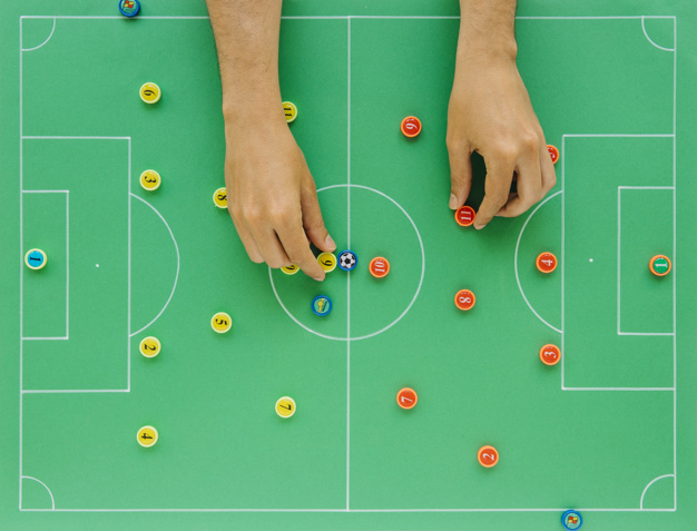 sfondo di calcio con il concetto di tattiche e le mani 23 2147832059 - Come si gioca al fantacalcio